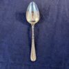 Zilveren opscheplepel perle, lang 25,8 cm.Andries Cornelis Kooiman jaarletter D 1888