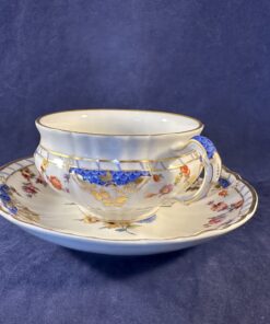 KPM 'Berlin Rocaille Breslauer Stadtschloss' theekop en schotel Ø 9 cm.hoog 5,3 cm.