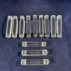 Set van 12 geslepen kristallen messenleggers lang 8,3 cm.