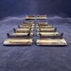 Keltum set van 12 verzilverde messenleggers 5,5 x 3,5 cm.